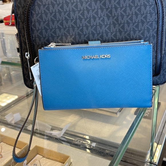MICHAEL KORS LARGE DOUBLE ZIP WRISTLET WALLET PHONE CASE CLUTCH 
Teal
NWT - Picture 14 of 16